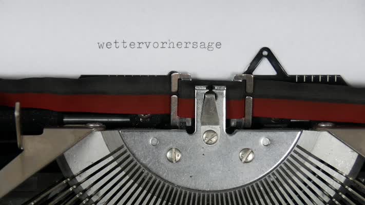 534_Wettervorhersage_drehen_Schreibmaschine
