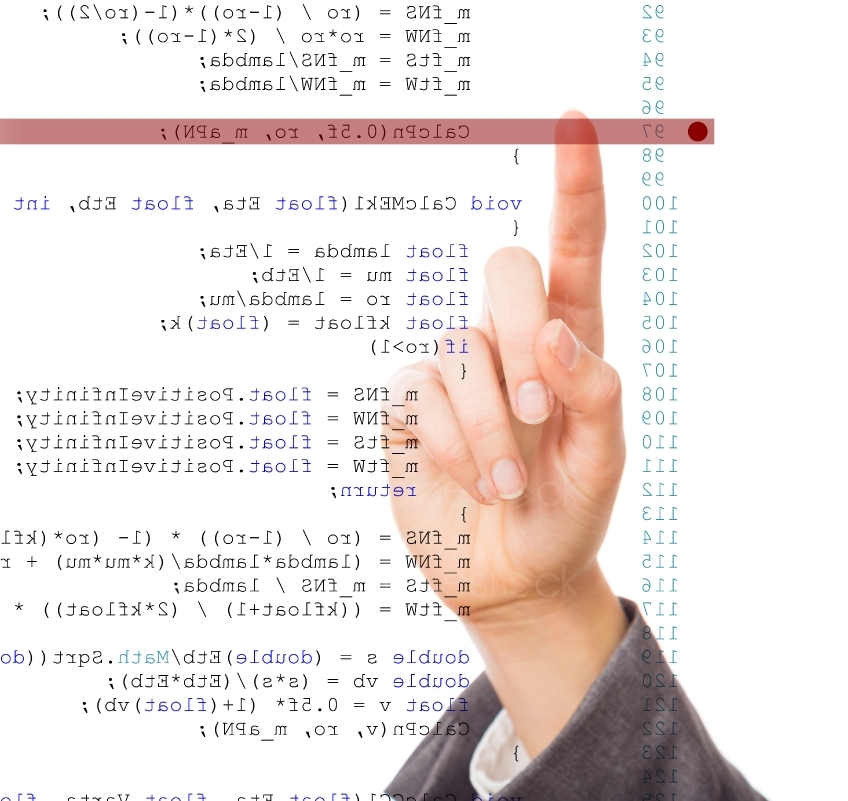 Hand zeigt auf eine Zeile im Programmiercode 20130216-0507